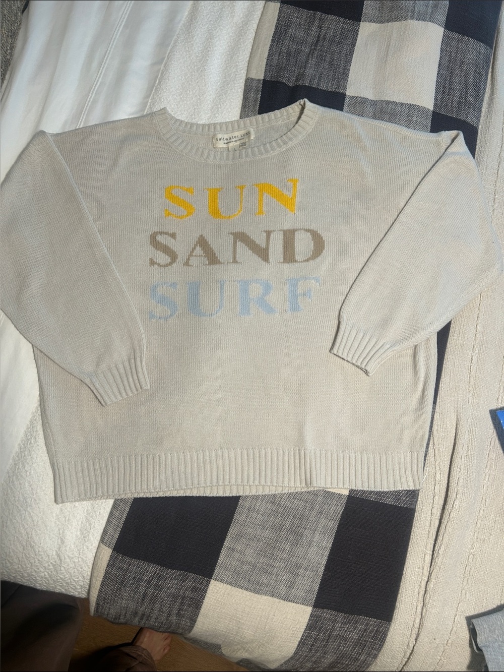 saltwater LUXE Cream Crewneck Sweater with Yellow, Tan, and Light Blue Text